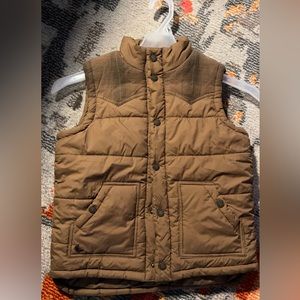 Light brown western inspired vest with plaid accents.